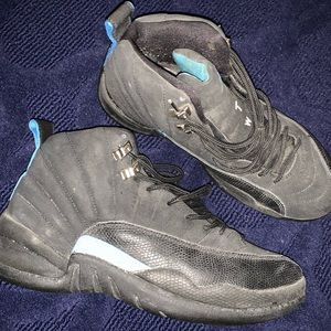 USED-air Jordan bred 12s in black and blue